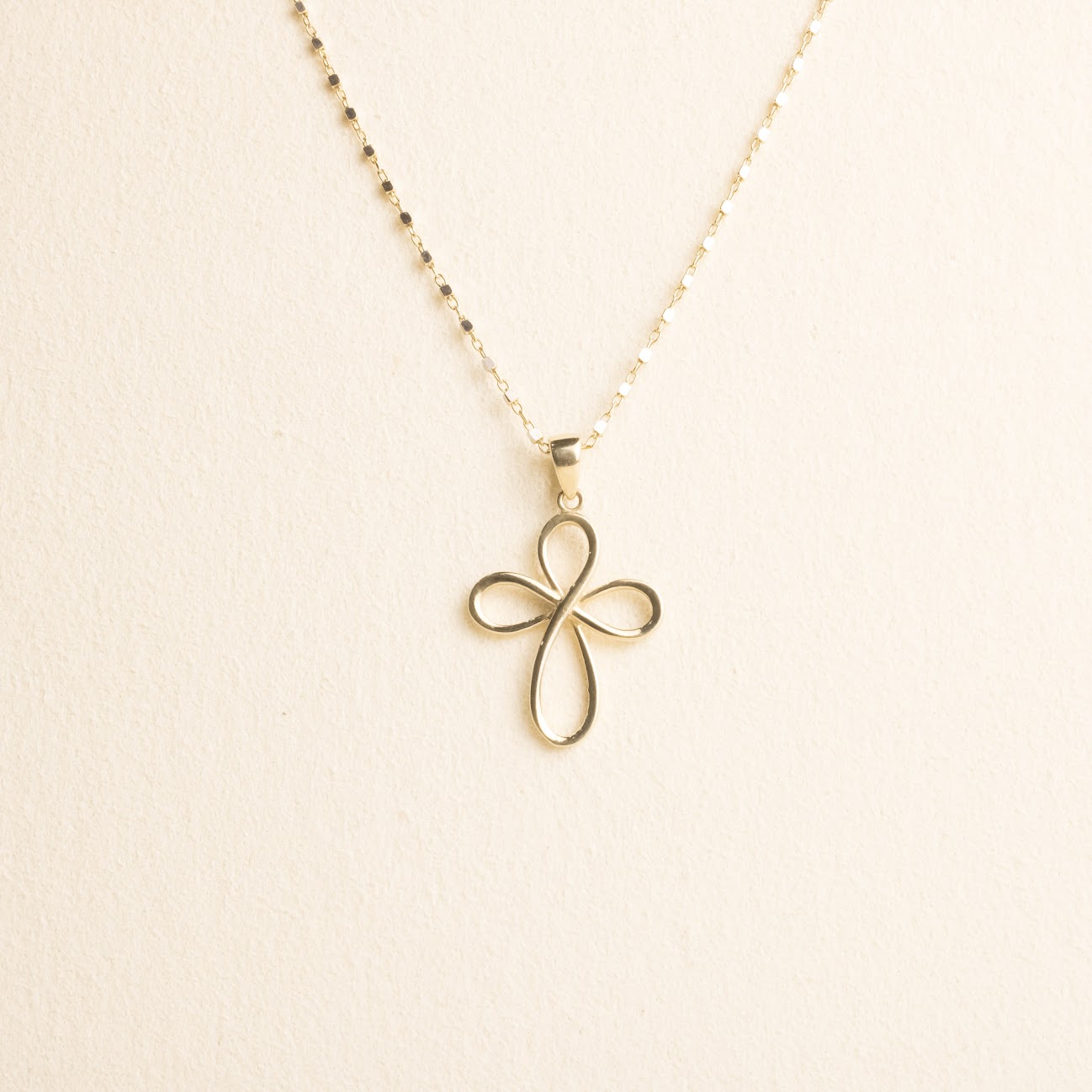 Cruz Infinito Oro 10k con cadena (DIV)